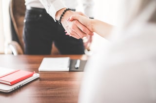 business-man-and-woman-handshake-in-work-office-picjumbo-com.jpg